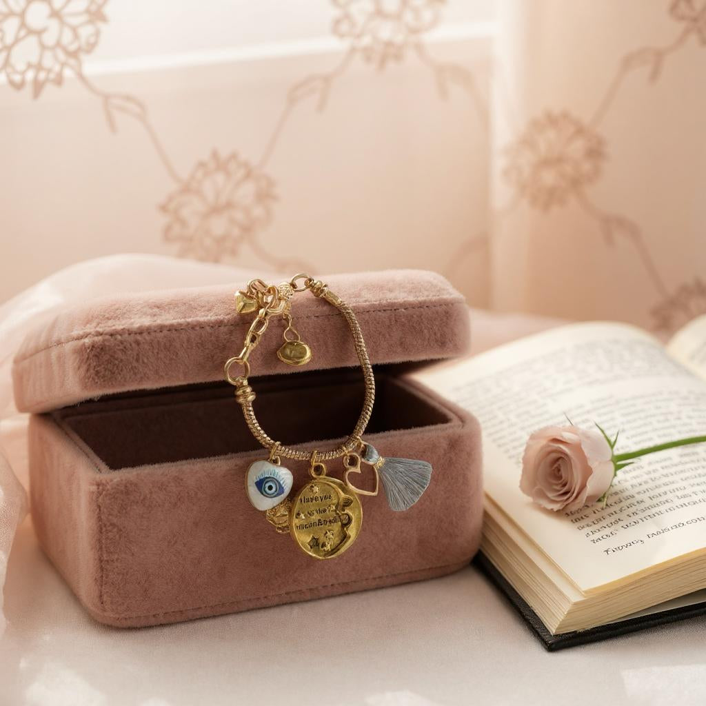 Pulsera de cordón de acero inoxidable bañada en oro con dijes colgantes y cierre extensible – Joyería elegante para mujer