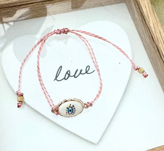 Pulsera de Mujer Hecha a Mano con Hilo Trenzado y Dije de Acero Inoxidable con Baño de Oro y Ojo Turco