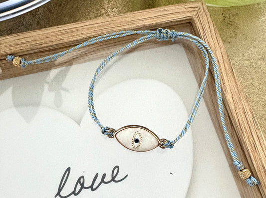 Pulsera de Mujer Hecha a Mano con Hilo Trenzado y Dije de Acero Inoxidable con Baño de Oro y Ojo Turco