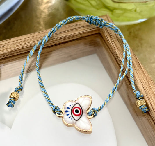 Pulsera de Mujer Hecha a Mano con Hilo Trenzado y Dije de Acero Inoxidable con Baño de Oro y Ojo Turco